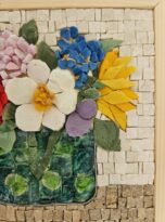ortesie in mosaico sporgente con vaso tondo