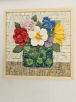 ortesie in mosaico sporgente con vaso tondo